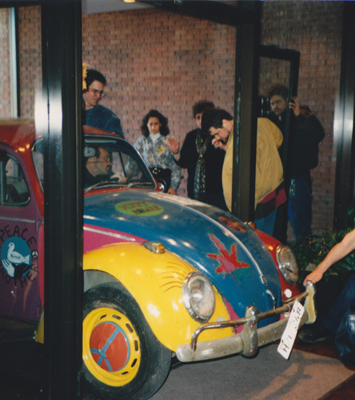 Volkswagen bug being brought into the lobby by Krannert Center staff