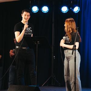 Two Lyric Theatre students, a man and a woman, perform on Stage 5
